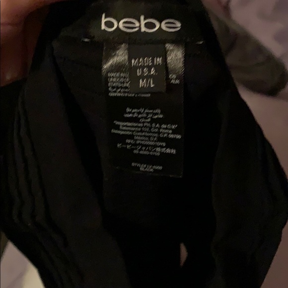 Bebe black stretchy skirt with ruffle like design - Picture 2 of 2